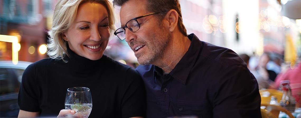 Couple enjoying a glass of wine and the Best Western Premier Life