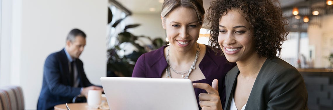 Women looking at laptop