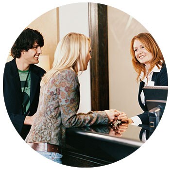 Couple at front desk