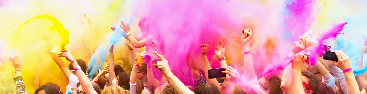 Festival with colored powder thrown into the air