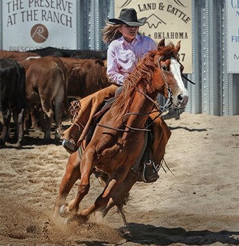 Image of rodeo woman on horseback