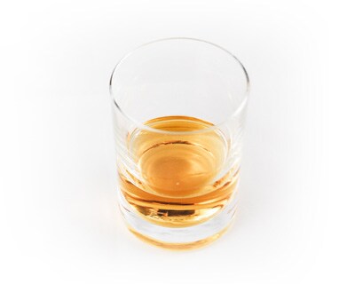 Glass of distilled drink