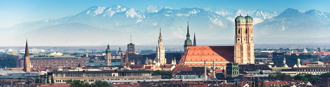 Munich, Germany skyline and alps