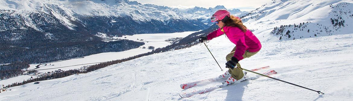 woman skiing at a ski resort destination 