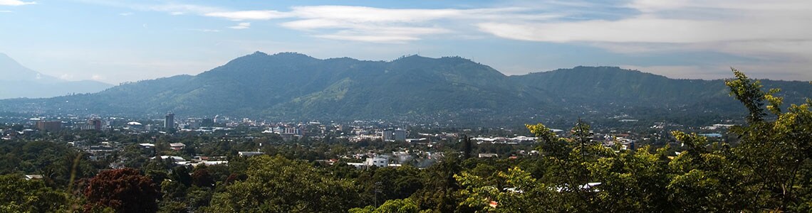 Blue sky with wispy clouds over San Salvador