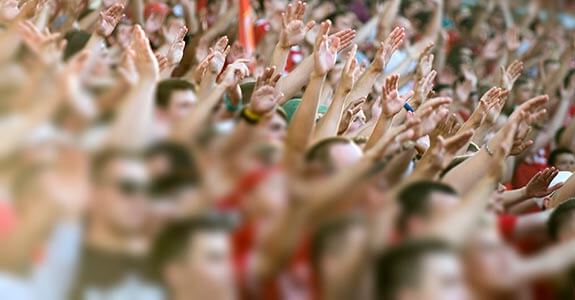 Fans cheerinfg at a sporting event in Florida