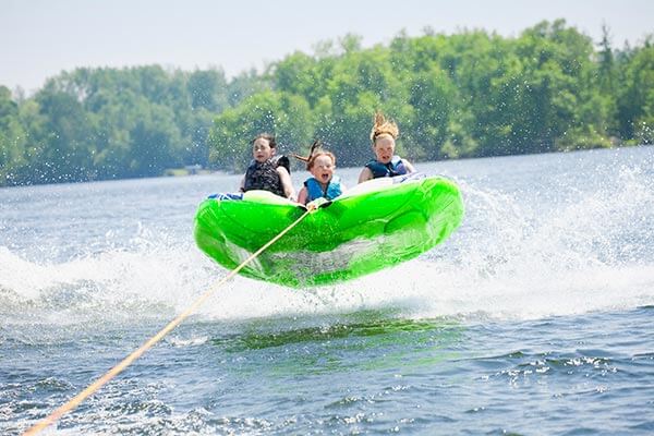 Kids tubing on a lake in SD
